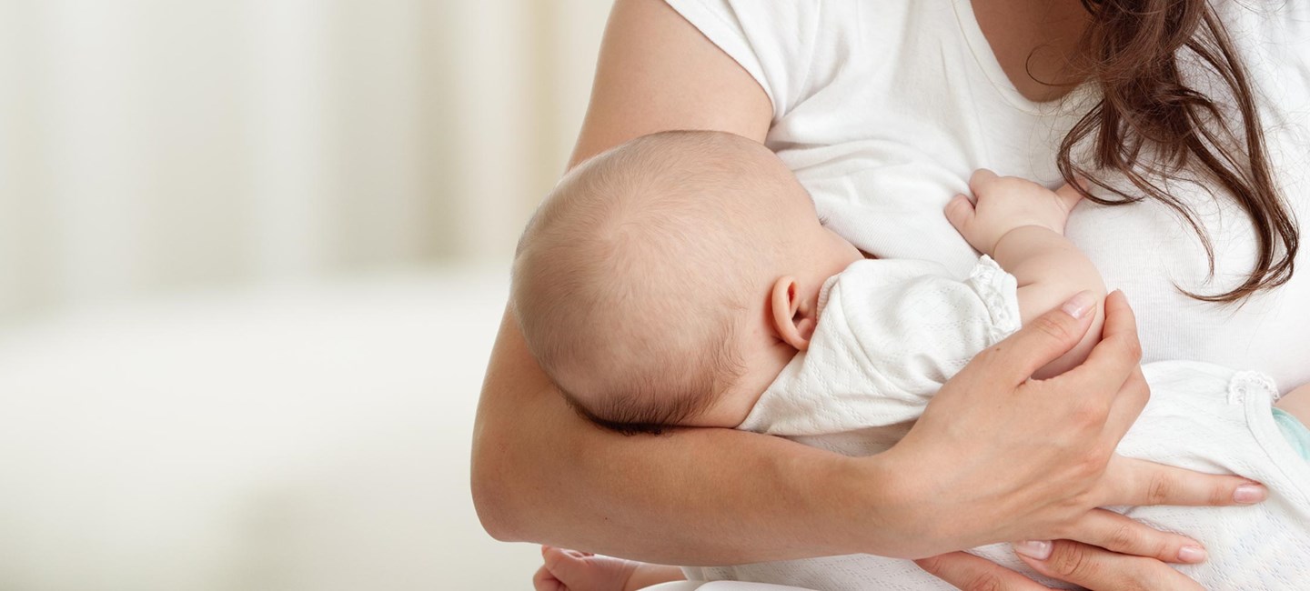 Mother breastfeeding a baby