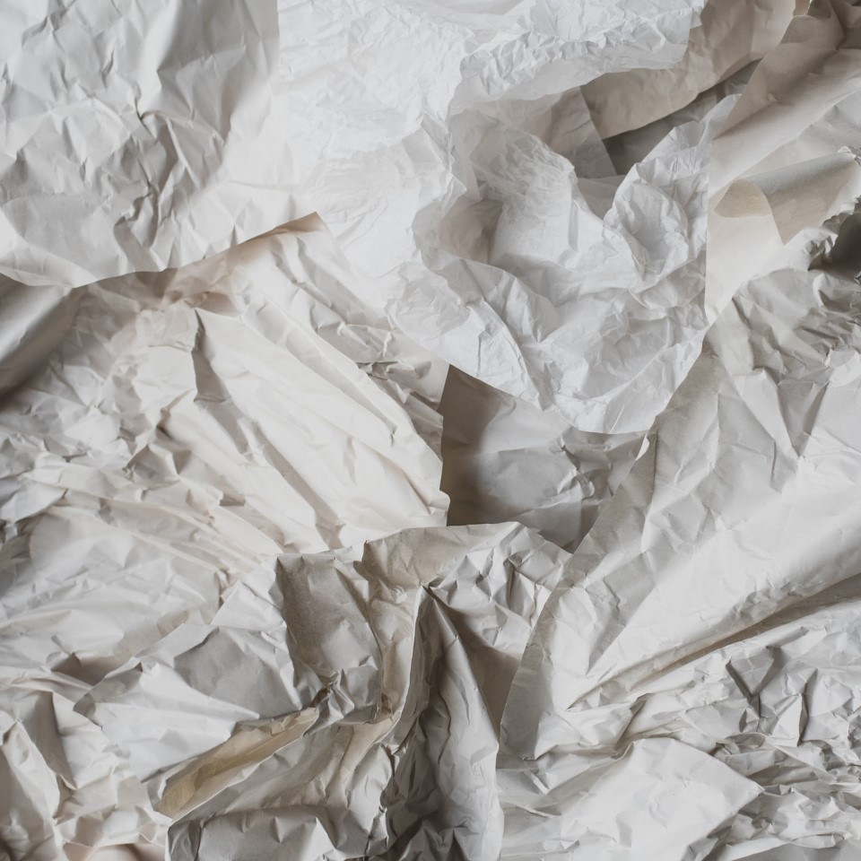 Crumpled white paper.