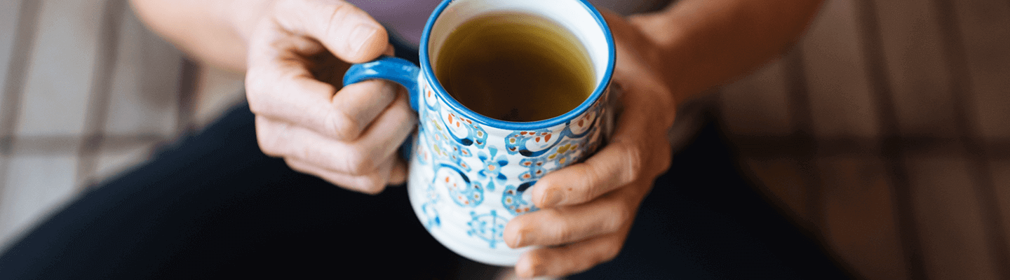 Woman holding a cup of tea